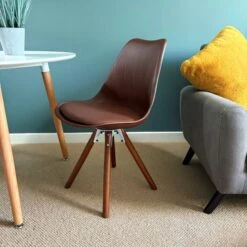 Fusion Living Soho Plastic Dining Chair With Pyramid Legs 30 Fusion Living Soho Plastic Dining Chair With Pyramid Legs -Home Luxe Studio 30960336